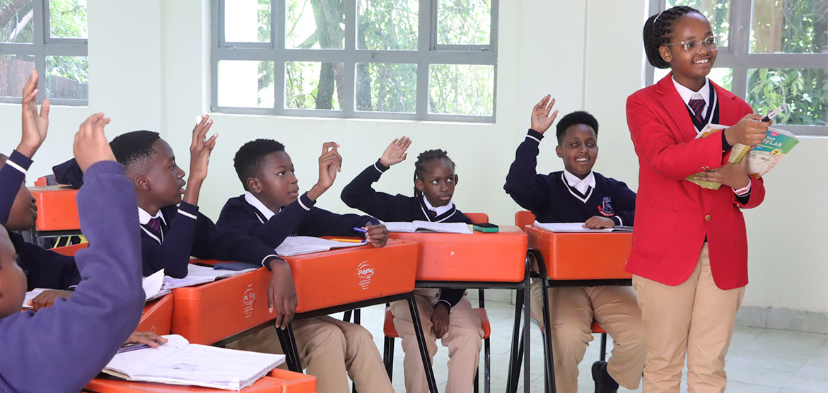A student leads a class session at Jalyn Junior Secondary Kitisuru Campus